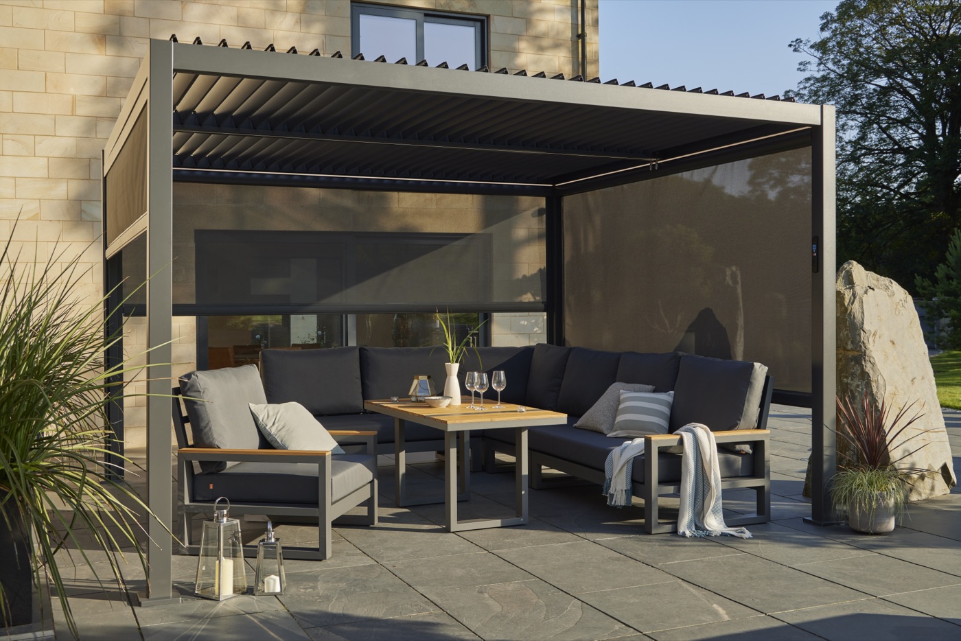 Textilene side screens deployed on the pergola